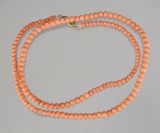 TWO CORAL NECKLACES []