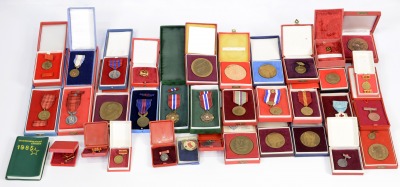 Set of medals, awards, and badges in etuies