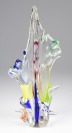 Statue of metallurgical glass []