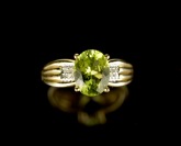 Ring with a green stone []