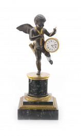 Figural table clock with a Cupid