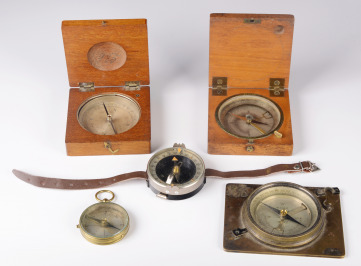 A Collection of five Compasses