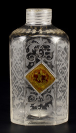 Bottle with a carving and a medallion